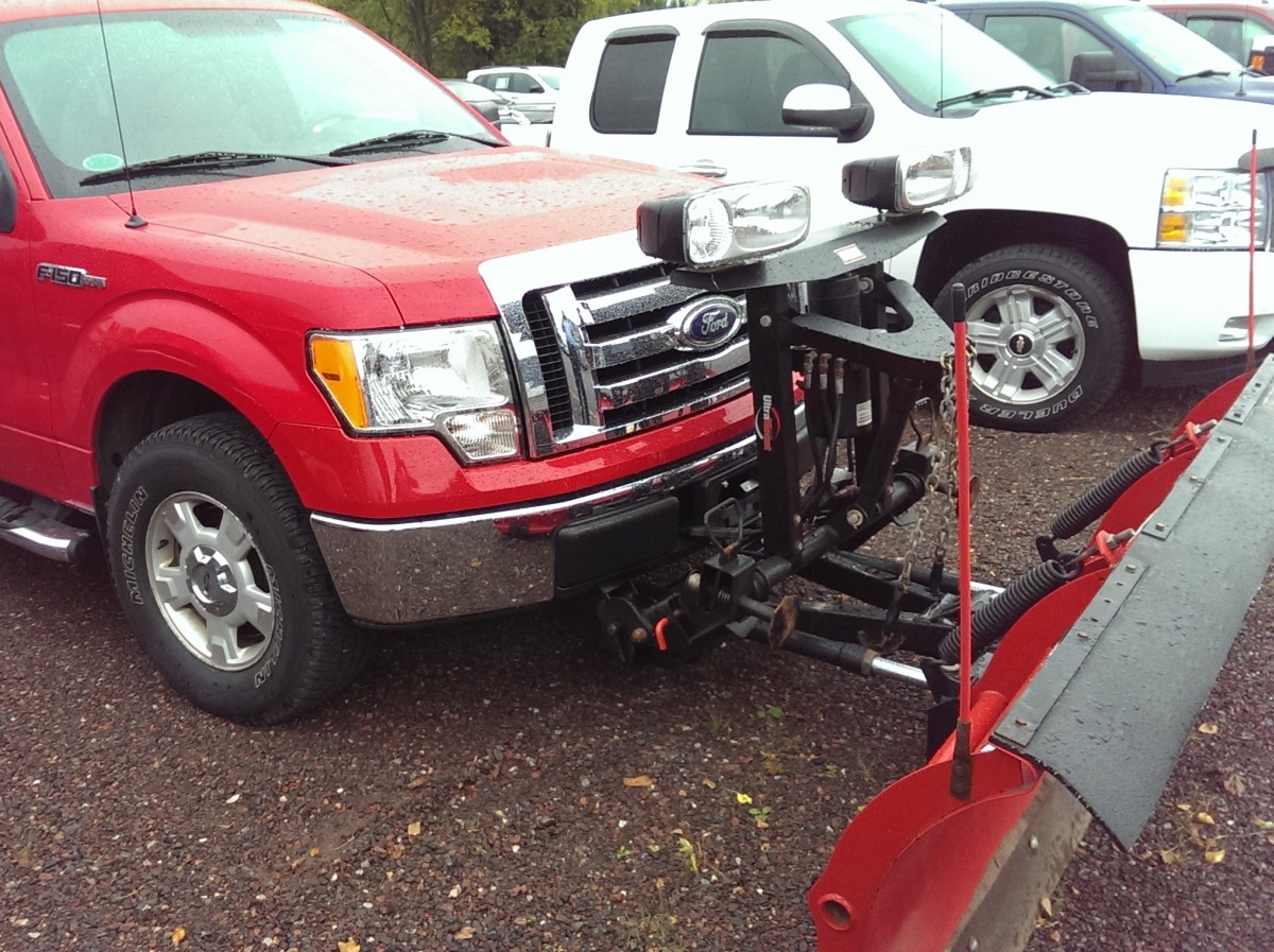 2010 Red Ford F150 with Western Plow Big Valley Ford Ewen Michigan September 2015 001