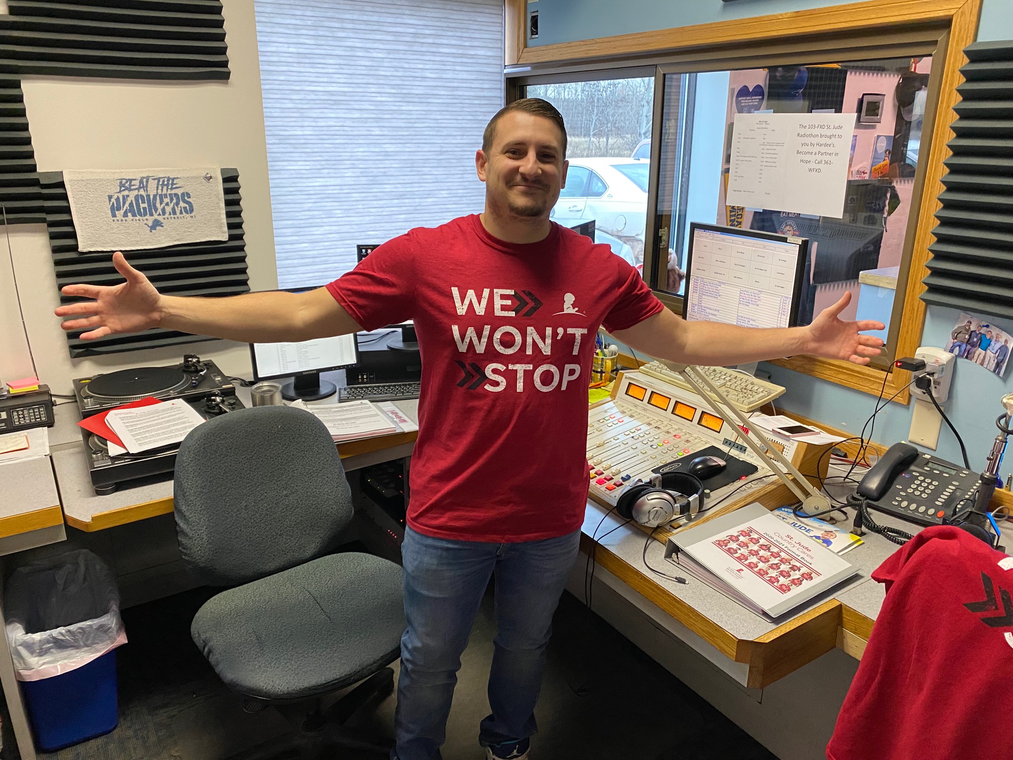 Luke Wearing WE WON'T STOP, the St. Jude Shirt for Partners in Hope